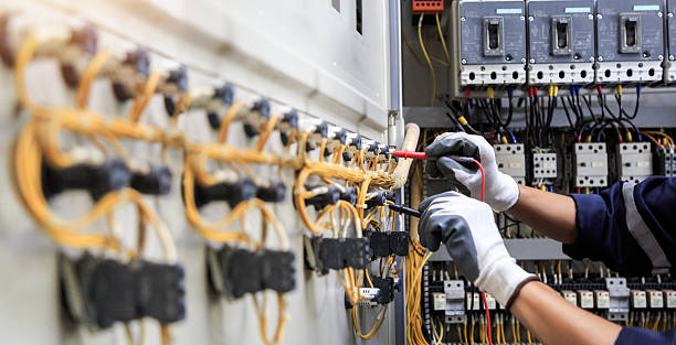 Professional Electrician technician working in Priceville, AL